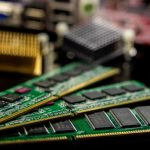 Detailed view of RAM sticks and microprocessors on a motherboard. — Bulk Wholesale Electronic Items at Cheapest Prices