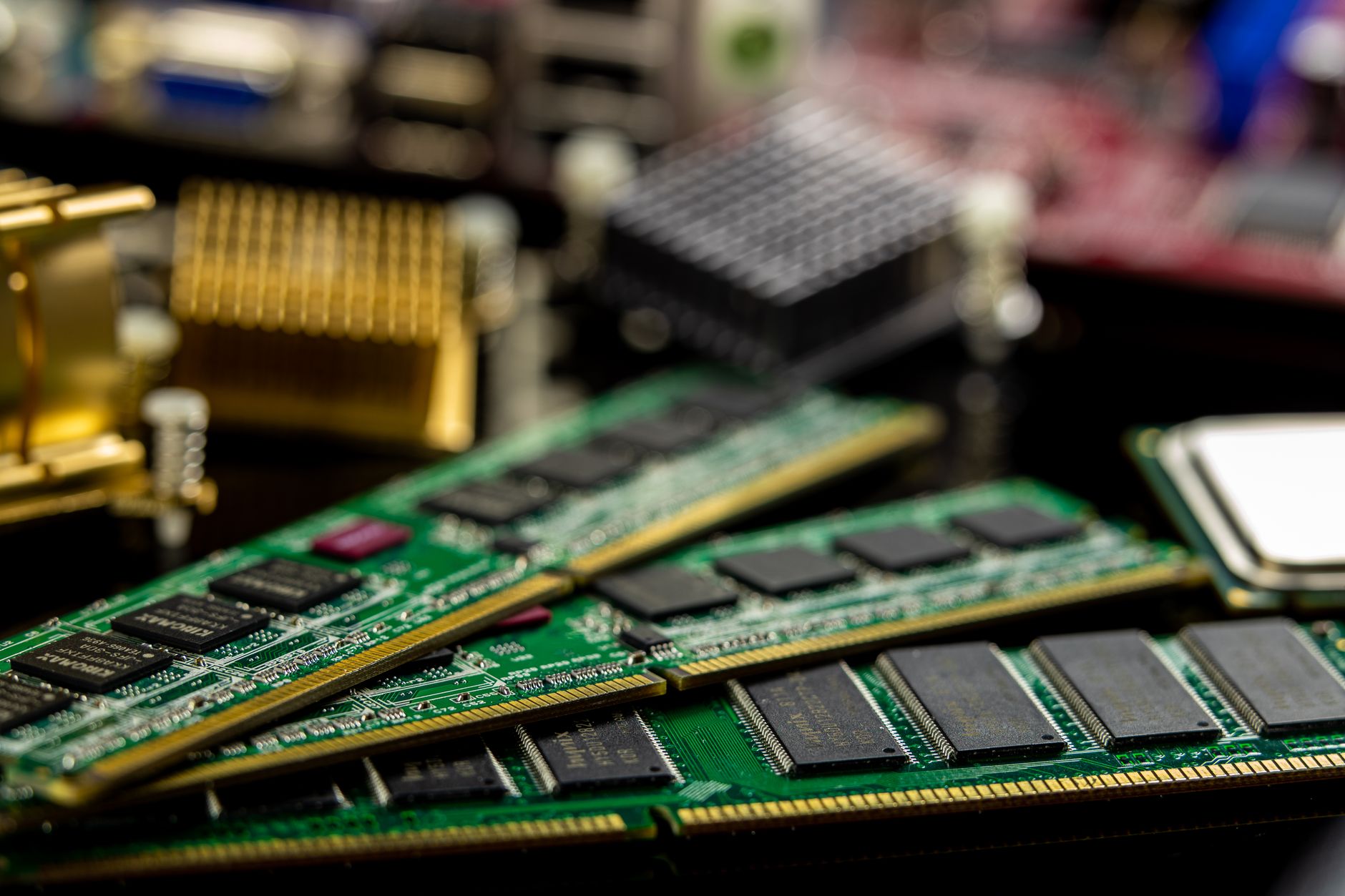 Detailed view of RAM sticks and microprocessors on a motherboard. — Bulk Wholesale Electronic Items at Cheapest Prices