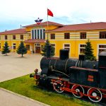 A vintage steam locomotive displayed at the Sivas Railway Station in Turkey, showcasing historical transport heritage. — Expl