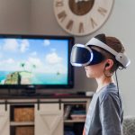 A young boy using a VR headset, fully engaged in a virtual reality experience indoors. — Instructions On How Change iPhone Si