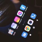 Smartphone screen showing popular social media and app icons including Facebook and Instagram. — Is Social Media Right for th