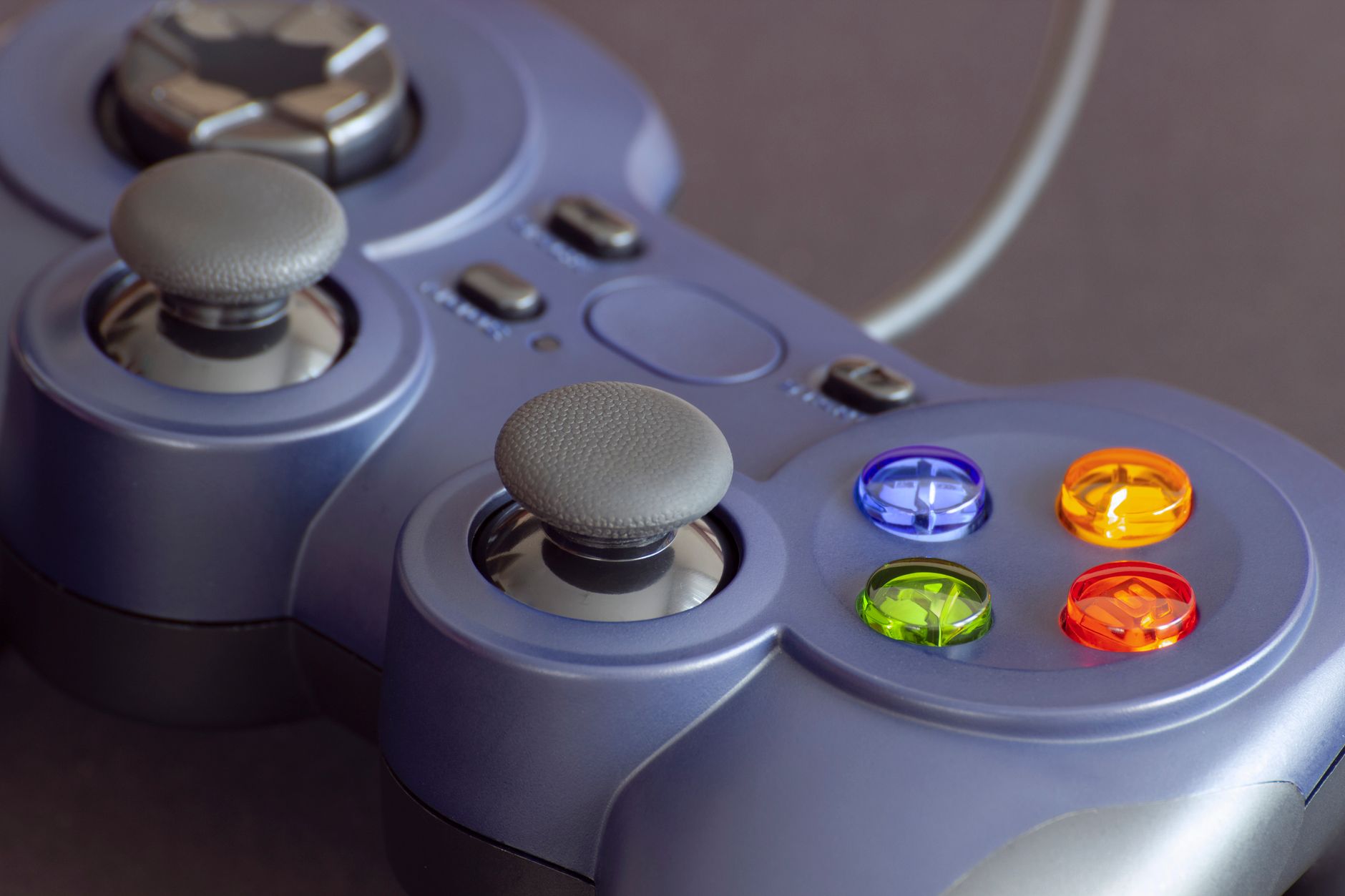 Detailed close-up of a gaming controller emphasizing its vibrant buttons. — Mobile Game Private Server: Delivering Innovative