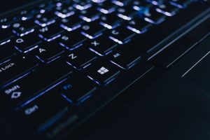 Detailed view of an illuminated laptop keyboard showing individual keys and backlight effect. — Take Advantage of the Interne