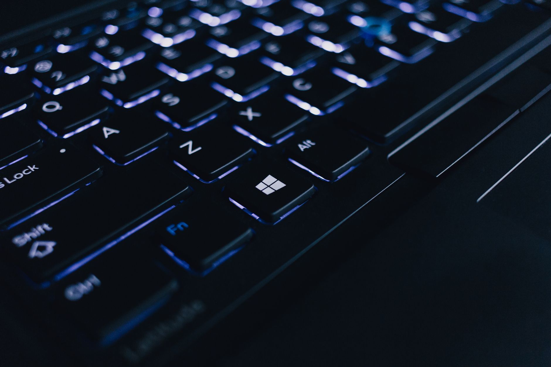 Detailed view of an illuminated laptop keyboard showing individual keys and backlight effect. — Take Advantage of the Interne