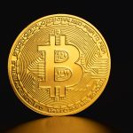 Close-up of a golden Bitcoin coin on a dark background symbolizing cryptocurrency and digital finance. — The History of 3D Te