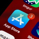 Close-up of App Store icon on iPhone screen with notification badge, highlighting app updates. — Understanding the DV Lottery