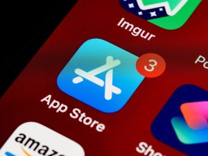 Close-up of App Store icon on iPhone screen with notification badge, highlighting app updates. — Understanding the DV Lottery
